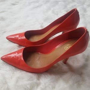 Coach coral patent pumps